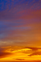 Fototapeta na wymiar Phantasmagorical vivid colorful cloudscape at sunset time. Abstract nature background.