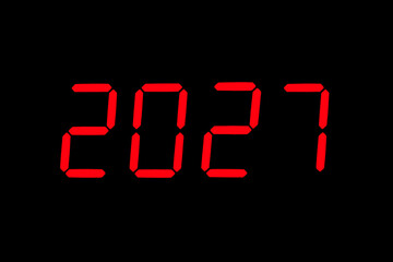 The dial of the electronic clock which shows the year 2027
