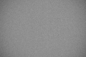 Black and white digital noise surface texture pattern with vignette.