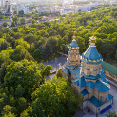 Fototapeta na wymiar Drone view of Lazarus church (Lazarevskaya church, 1902) and Necropolis on sunny summer evening. Pyatigorsk, Stavropol Krai, Caucasus, Russia.