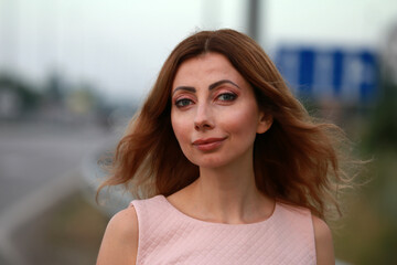 Obraz premium Portrait of beautiful woman in the street