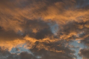 Chmury podczas zachodu słońca - obrazy, fototapety, plakaty