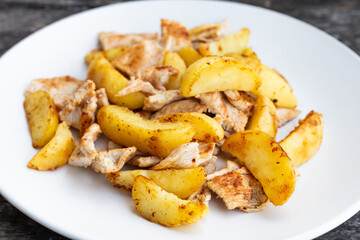 Pan-fried chicken and potatoes