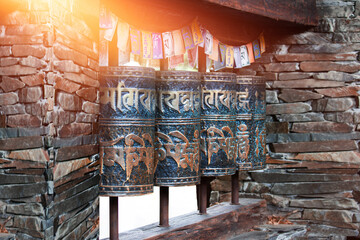 Buddhist prayer drums with close-up mantras