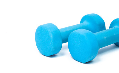 blue fitness dumbbells on a white background. the concept of a healthy lifestyle. fitness attributes