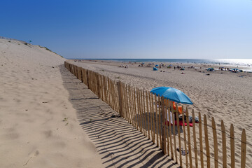 Umbrella on le Pin sec beach beach in Gironde coast           