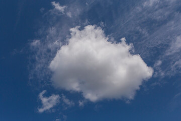 Naklejka na ściany i meble small cloud in a blue sky