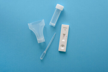 Covid19 antigen test kit with cassette, pipette and plastic bottle for saliva. Negative result