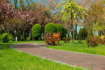 Picturesque view of beautiful park with fresh green grass and trees