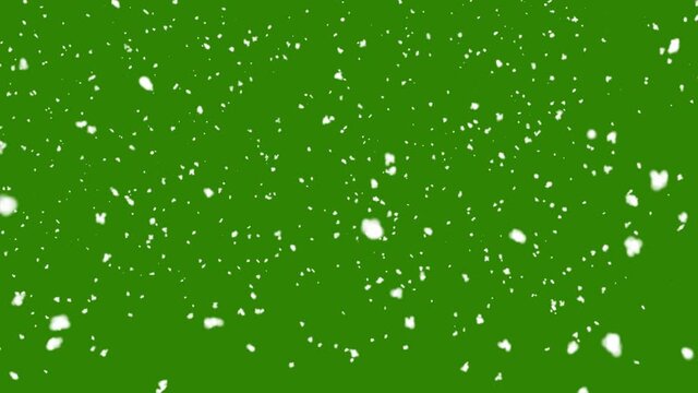 Snow falling on green background