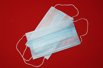 Surgical mask on Red background