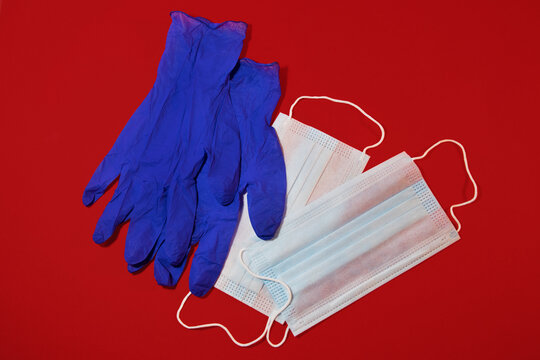 Still Life Of A Face Mask And Blue Protective Gloves With Stethoscope