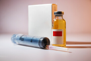 Coronavirus Covid-19 vaccine with syringe isolated on Dark background