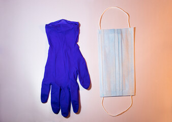 Still life of a face mask and protective gloves