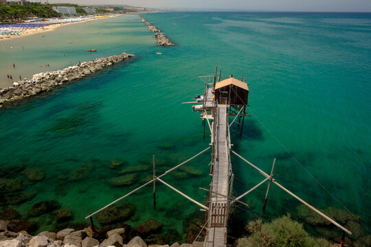 The amazing adriatic sea with fishing trebuchet on the beach of Termoli , Molise , Italy