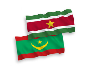 National vector fabric wave flags of Islamic Republic of Mauritania and Republic of Suriname isolated on white background. 1 to 2 proportion.
