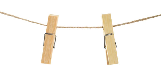 Two wooden clothespins on rope against white background