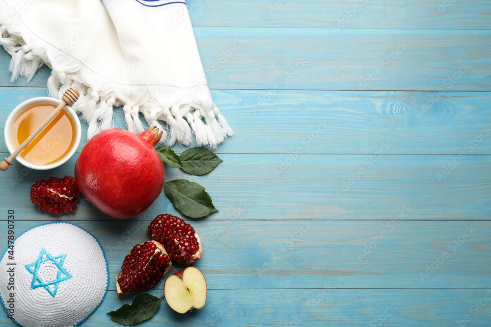 Sticker Flat lay composition with Rosh Hashanah holiday attributes on light blue wooden table. Space for text