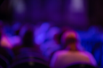 Blur texture background for design. Сoncert on scene theater, stage light with colored spotlights...