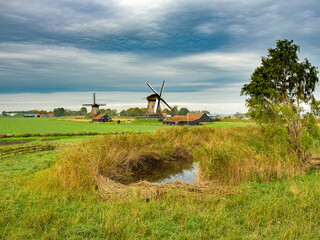 Naklejka premium Museum windmill, Bovenmolen E in Schermerhorn, Noord-Holland Province, The Netherlands