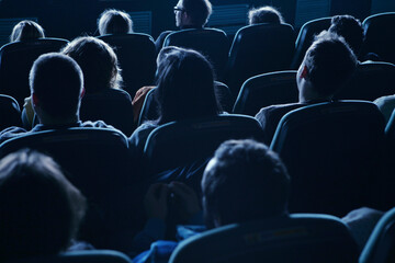 Rear view of audience in movie theater