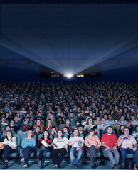 Fototapeta na wymiar Audience in movie theater