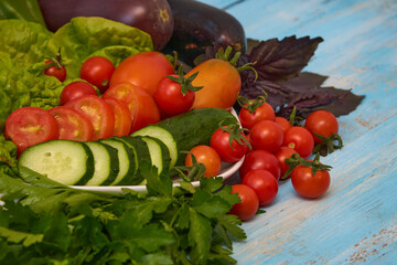 Ripe fresh vegetables on a plate. Vegetarian food