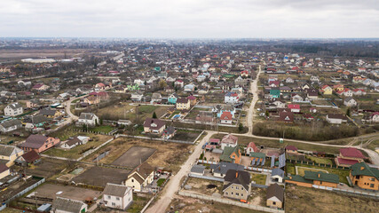 Fototapeta na wymiar Aerial view of a village in Ukraine with houses and country roads