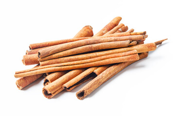 Cinnamon sticks on white.