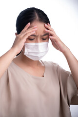 Asian woman is wearing mask on her face against coronavirus or COVID-19 disease. The Pollution Healthcare and virus pandemic concept.