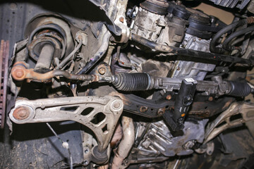 car suspension, levers, stabilizer bar and steering rack.