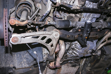 car suspension, levers, stabilizer bar and steering rack.