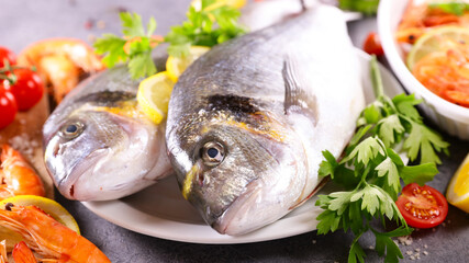 seafood- fresh fish with dorado, shrimp and ingredients