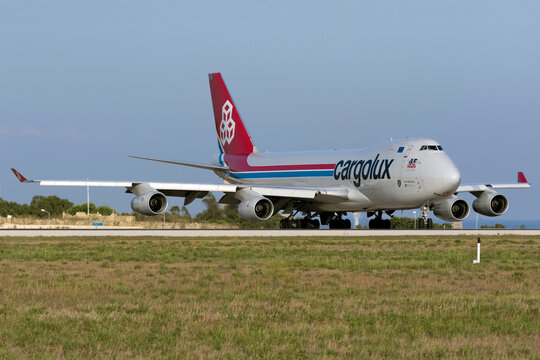 Luqa, Malta September 3, 2015: Cargolux Boeing 747-4R7F/SCD (Reg: LX-OCV) departing to Muscat, Oman after arriving from Luxembourg.
