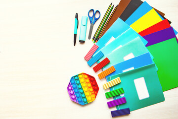 The different stationery on light background, flat lay with space for text. Back to school