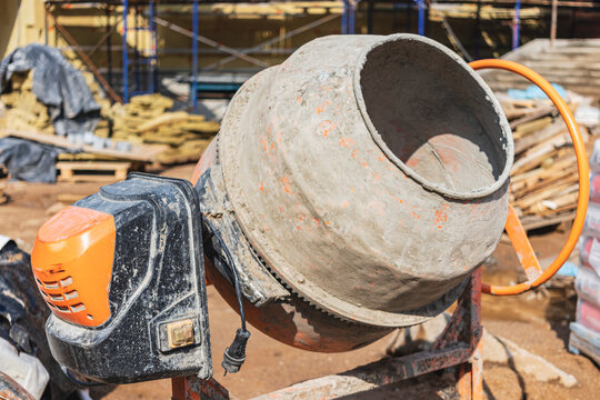 Industrial concrete mixer at a construction site. Preparation of concrete and mortar.