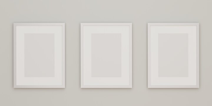Three white picture frame mock up on the wall. 3d rendering.