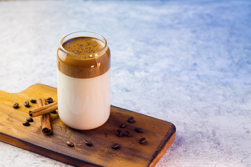 Dalgona coffee. Iced fluffy creamy whipped trend drink with coffee foam and milk. trendy summer cold drink
