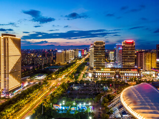 Aerial photography of the night view of Nantong Financial Center, Jiangsu