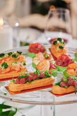 Assorted snacks on a festive New Year's table. Beautiful catering. High quality photo