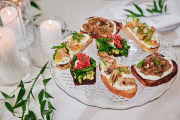 Assorted snacks on a festive New Year's table. Beautiful catering. High quality photo