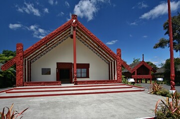 Tribal Meeting Hall of te Whakarewarewa living Maori village, Rotorua, New Zealand's North Island. - obrazy, fototapety, plakaty