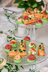 Assorted snacks on a festive New Year's table. Beautiful catering. High quality photo