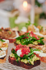 Assorted snacks on a festive New Year's table. Beautiful catering. High quality photo