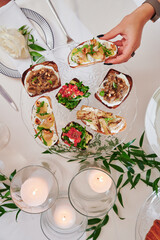 Assorted snacks on a festive New Year's table. Beautiful catering. High quality photo