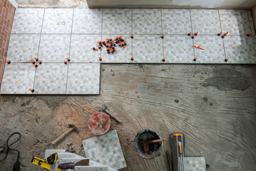 Top view of leveling system wedges for tiles