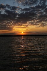 swimming at sunset