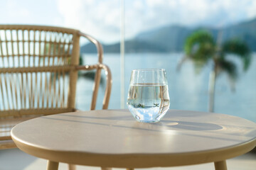 a glass of drink on the table