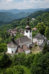Church in old mining village Spania Dolina, Slovakia - obrazy, fototapety, plakaty