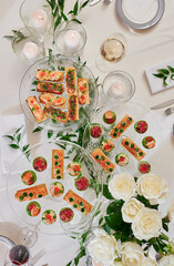 Assorted snacks on a festive New Year's table. Beautiful catering. High quality photo